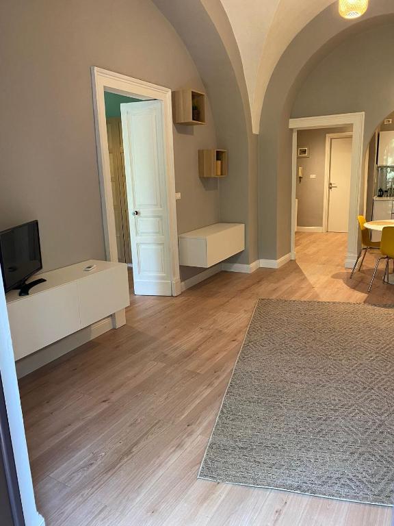Televízia a/alebo spoločenská miestnosť v ubytovaní Duomo Treehouse