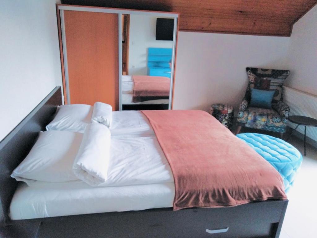 Postel nebo postele na pokoji v ubytování Apartman HAN