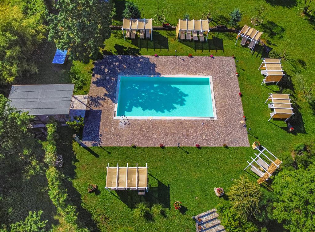 an overhead view of a yard with a swimming pool at La Valle De' Medici in Barberino di Mugello