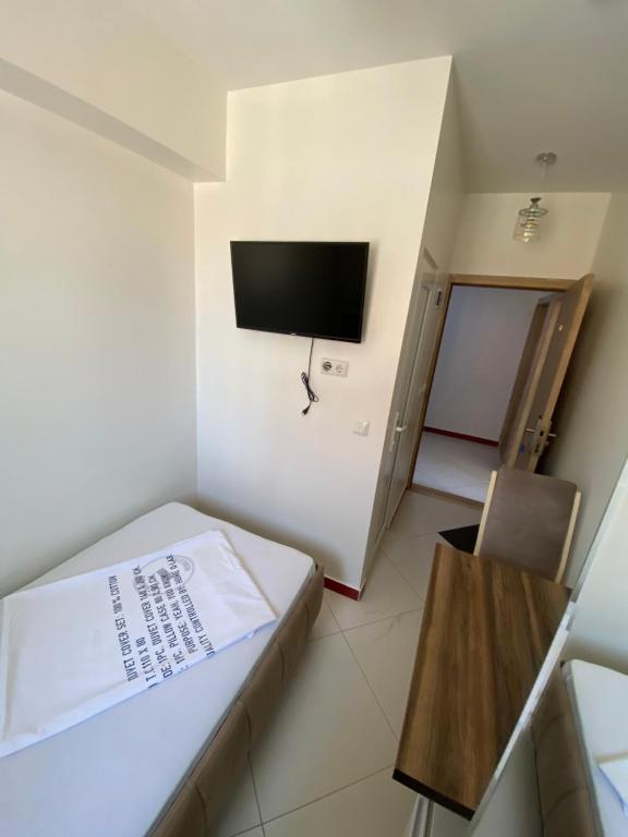 Postel nebo postele na pokoji v ubytování Hotel Heimli
