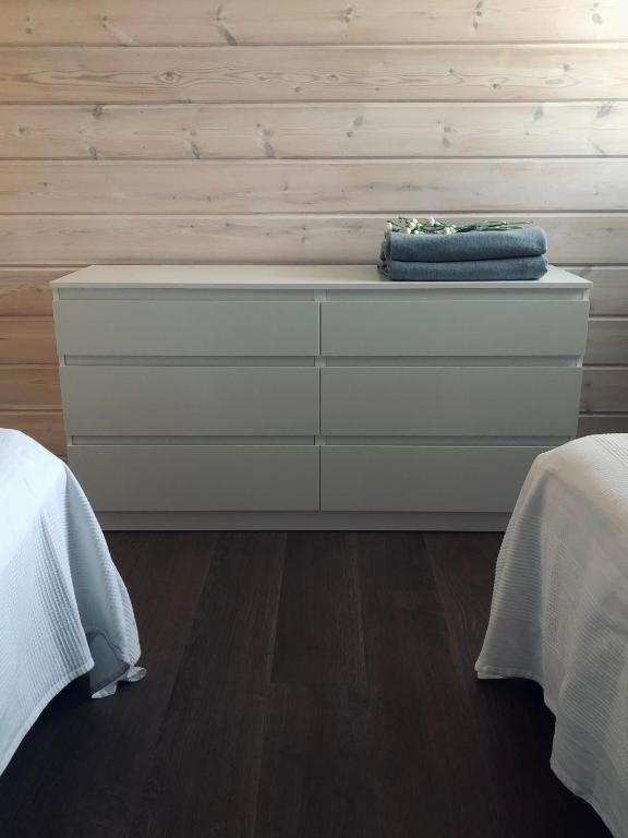 Postel nebo postele na pokoji v ubytování Ylläs Fell Inn