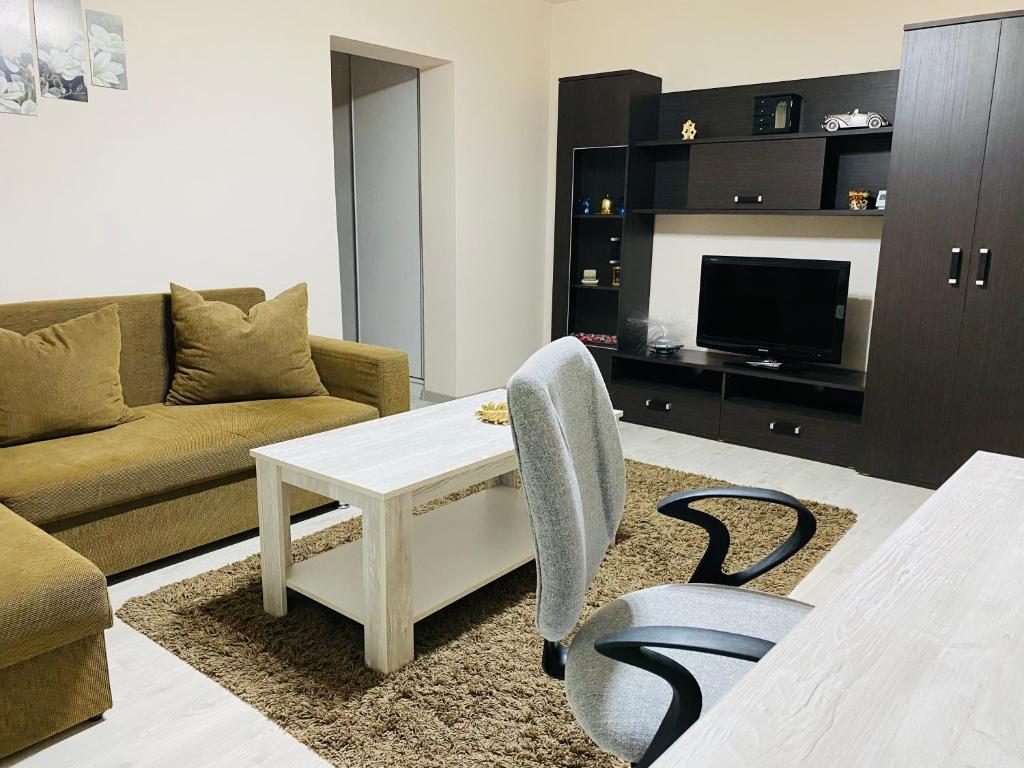 Кът за сядане в Sellada Apartament