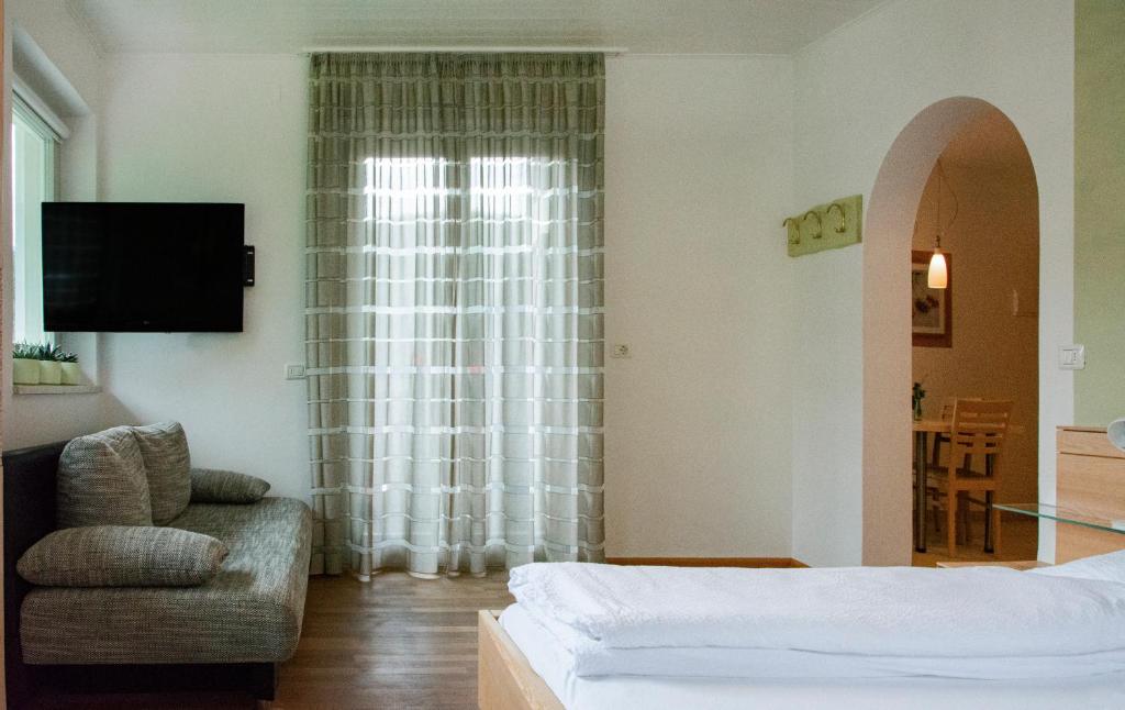 Postel nebo postele na pokoji v ubytování Villa Gottfried Appartment
