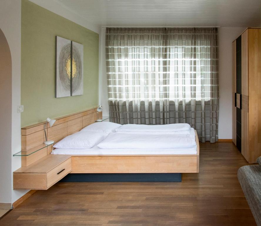 Postel nebo postele na pokoji v ubytování Villa Gottfried Appartment