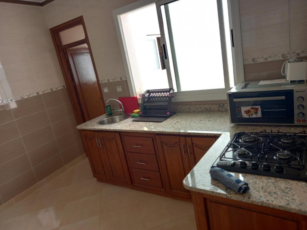 Kuchyň nebo kuchyňský kout v ubytování Nieuwbouw appartementen al hoceima