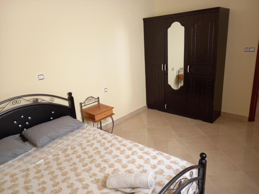 Postel nebo postele na pokoji v ubytování Nieuwbouw appartementen al hoceima