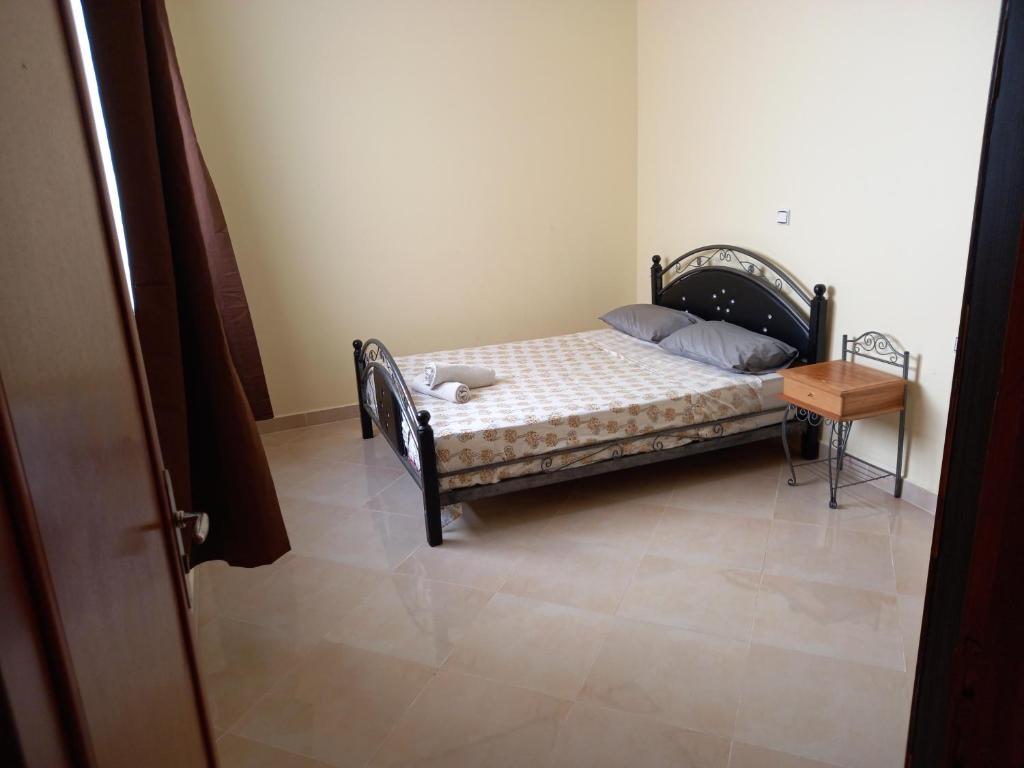 Postel nebo postele na pokoji v ubytování Nieuwbouw appartementen al hoceima