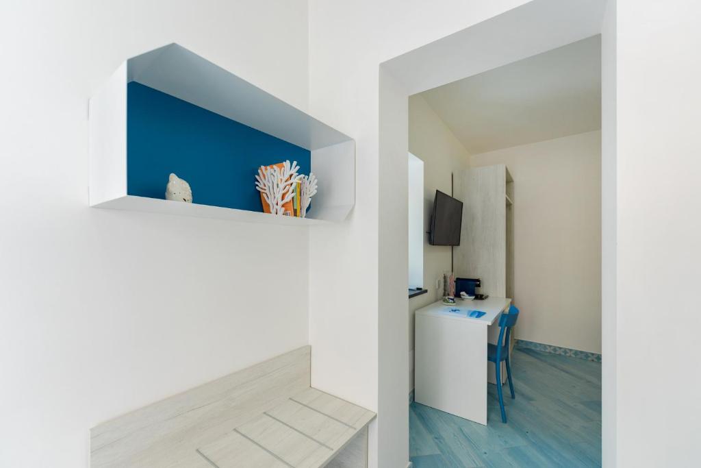 Kuchyň nebo kuchyňský kout v ubytování Poseidonia Rooms