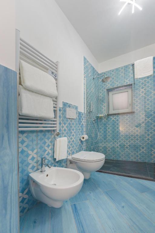 Koupelna v ubytování Poseidonia Rooms