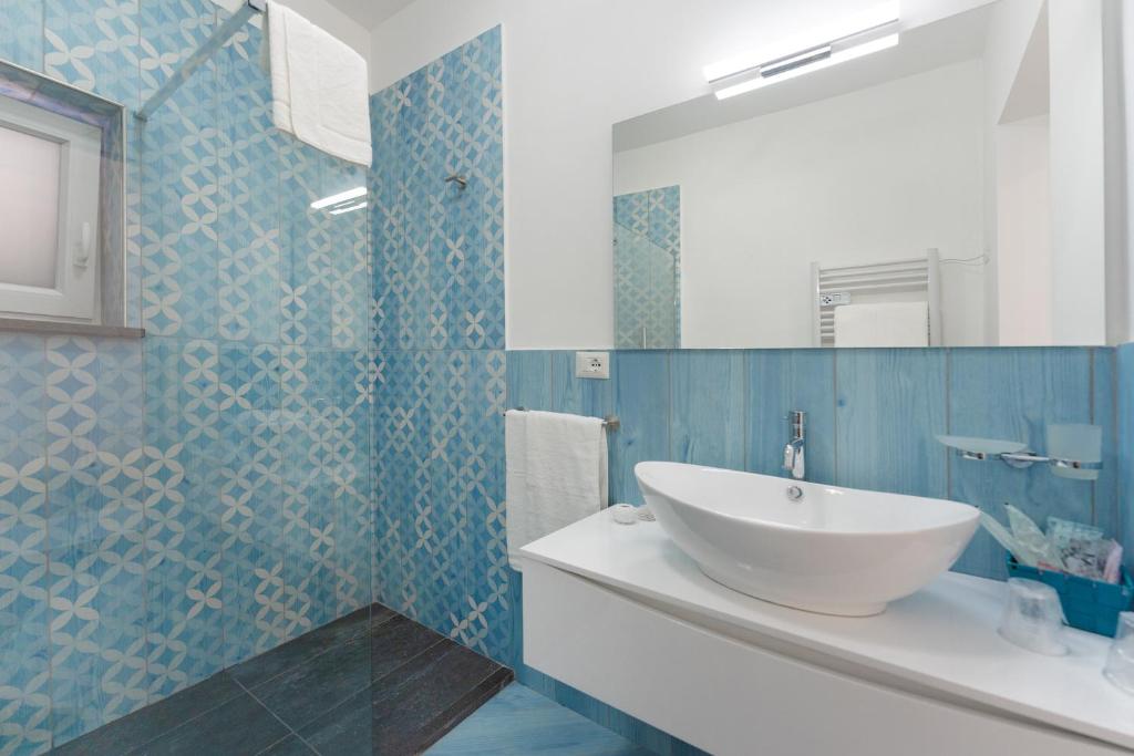 Koupelna v ubytování Poseidonia Rooms