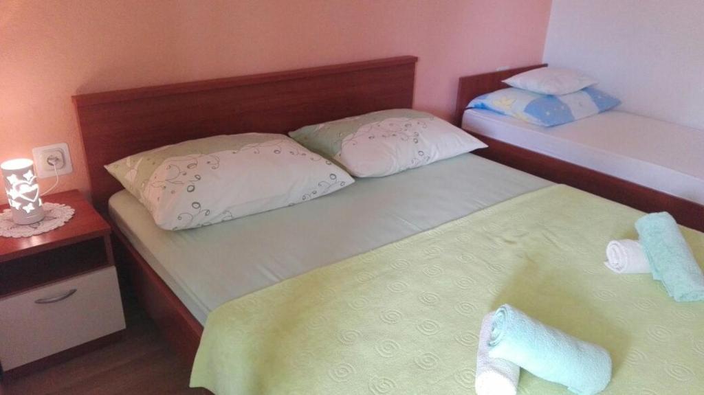 Posteľ alebo postele v izbe v ubytovaní Apartment Peris
