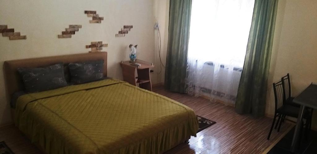 Postel nebo postele na pokoji v ubytování Apartments