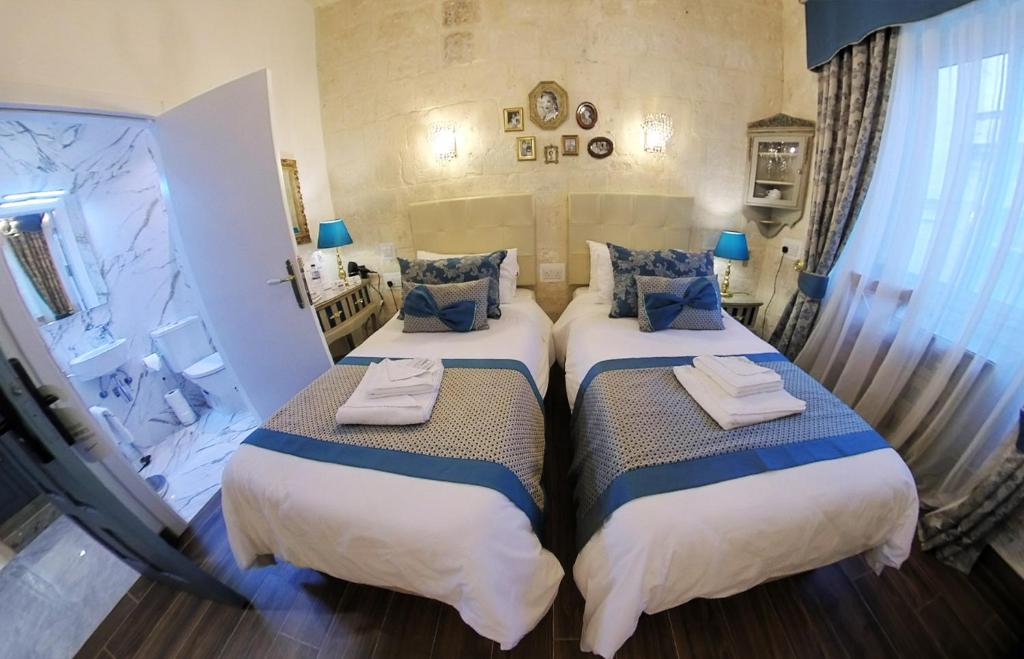 Postel nebo postele na pokoji v ubytování Casa Asti