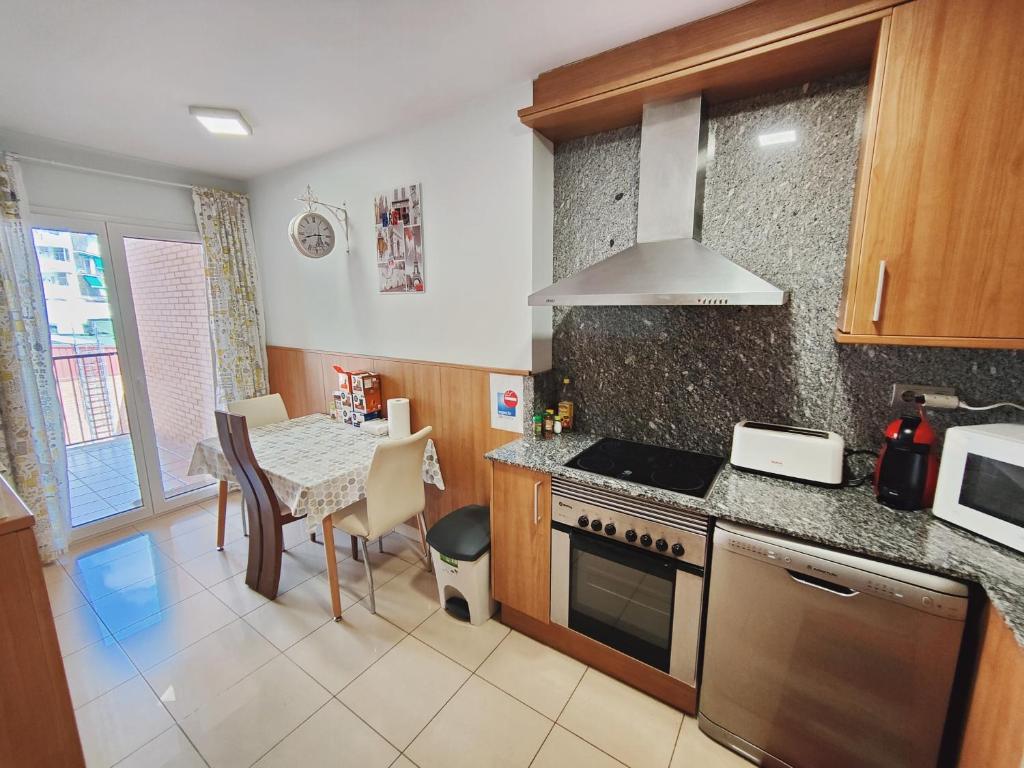 Kuchyň nebo kuchyňský kout v ubytování Agora Apartments
