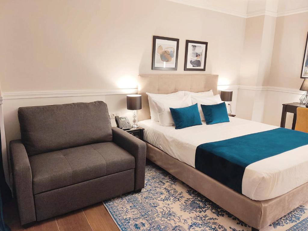 Posteľ alebo postele v izbe v ubytovaní Classic Hotel by Athens Prime Hotels