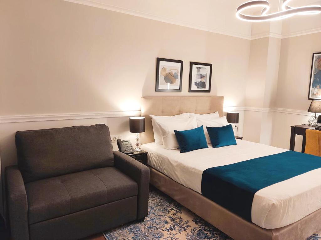 Posteľ alebo postele v izbe v ubytovaní Classic Hotel by Athens Prime Hotels