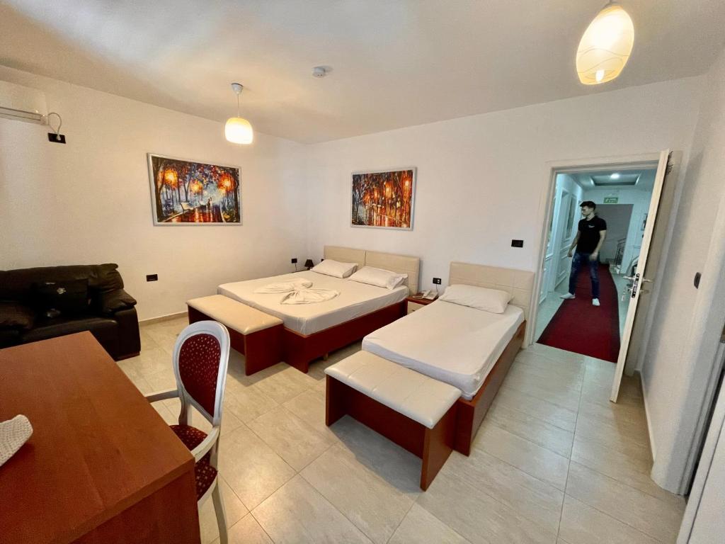 Postel nebo postele na pokoji v ubytování Vila Ada Hotel