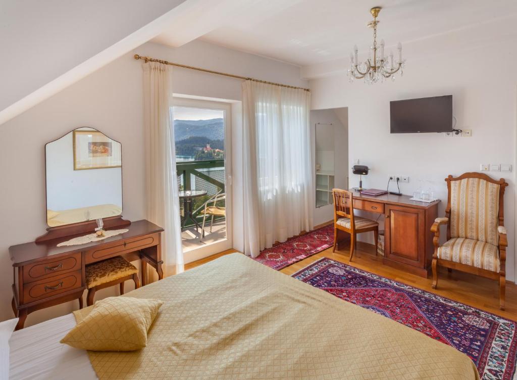 TV a/nebo společenská místnost v ubytování Hotel Triglav