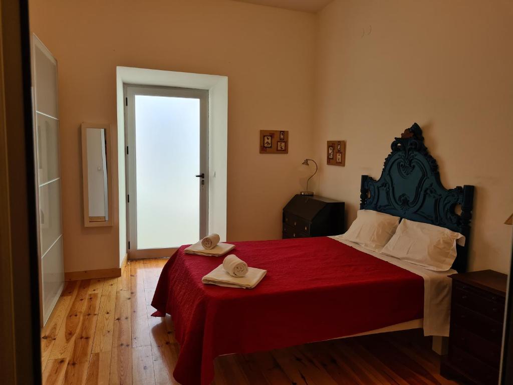 Postel nebo postele na pokoji v ubytování Casa do Armador