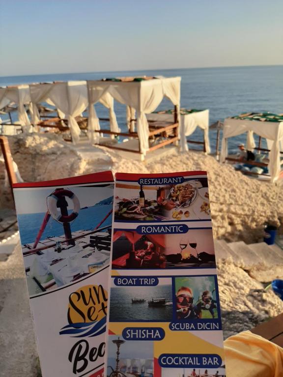 a sign on the side of a beach at Guesthouse DONA in Ulcinj