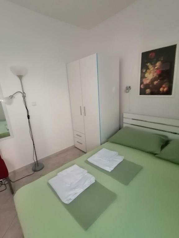 Postel nebo postele na pokoji v ubytování SINDI 3