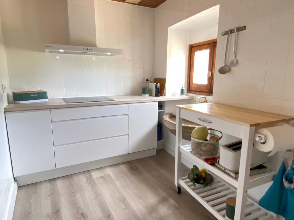 Kuchyňa alebo kuchynka v ubytovaní Apartamento rural Meaus