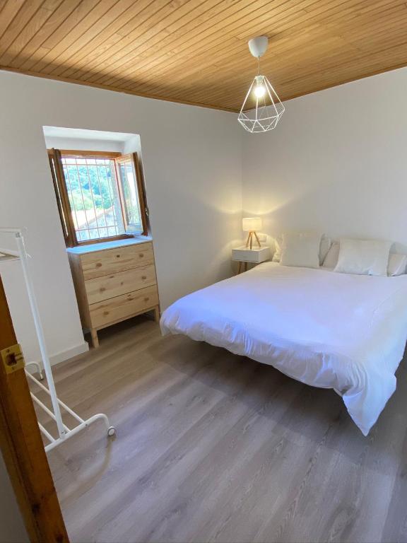 Posteľ alebo postele v izbe v ubytovaní Apartamento rural Meaus