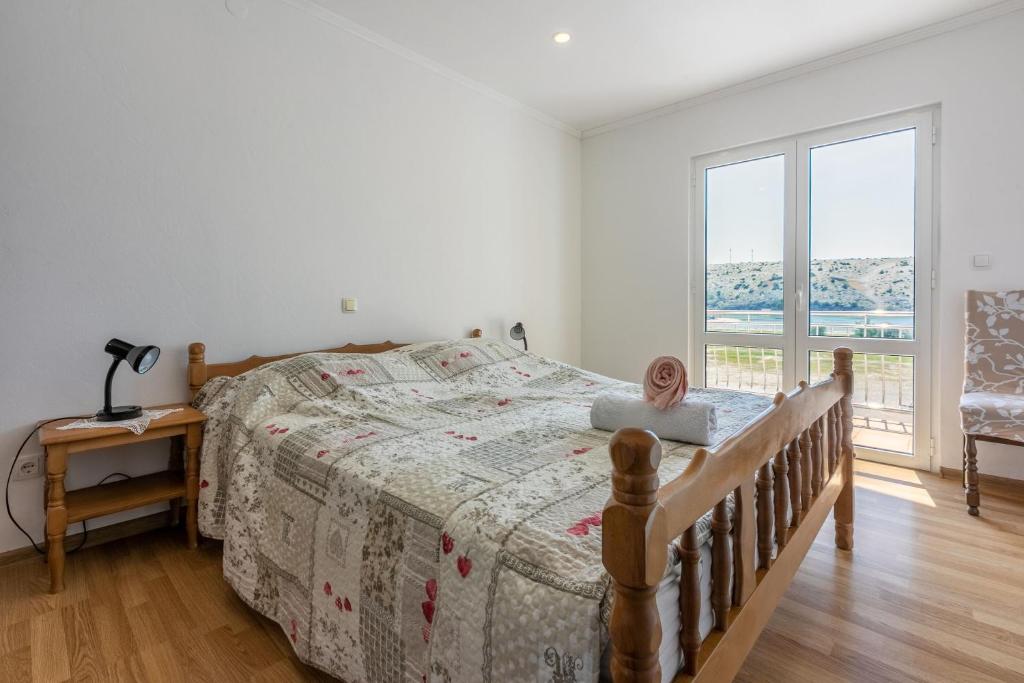 Postel nebo postele na pokoji v ubytování Apartments Lino
