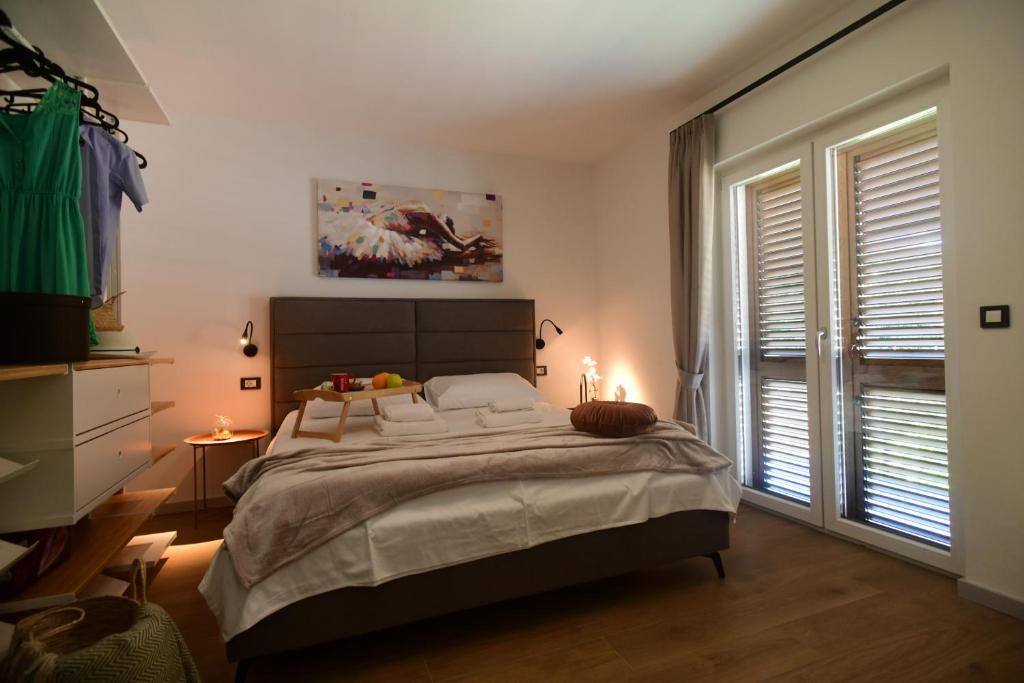 Postel nebo postele na pokoji v ubytování Luxury Apartment Vabriga