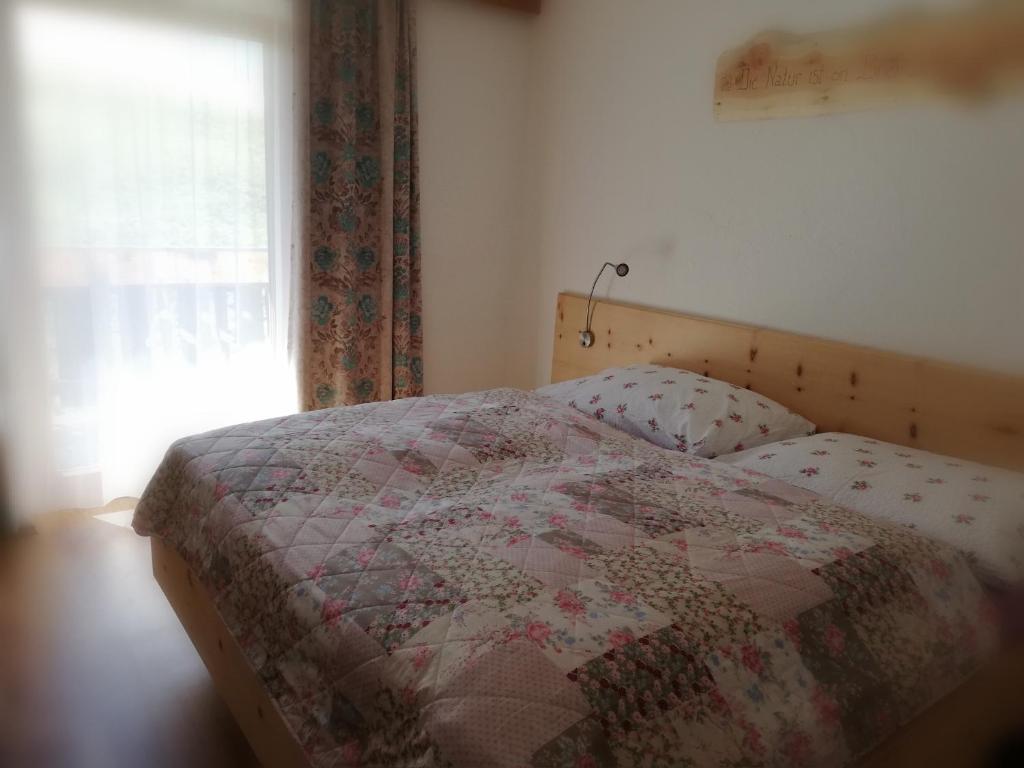 Postel nebo postele na pokoji v ubytování Silzerhof