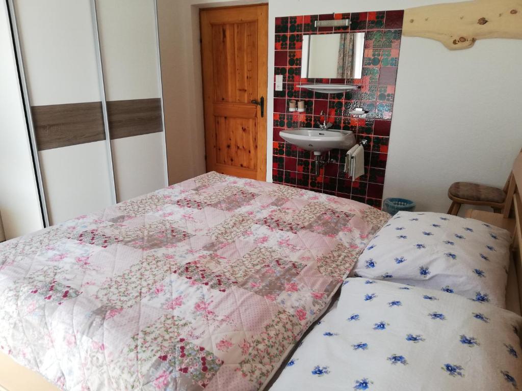 Postel nebo postele na pokoji v ubytování Silzerhof