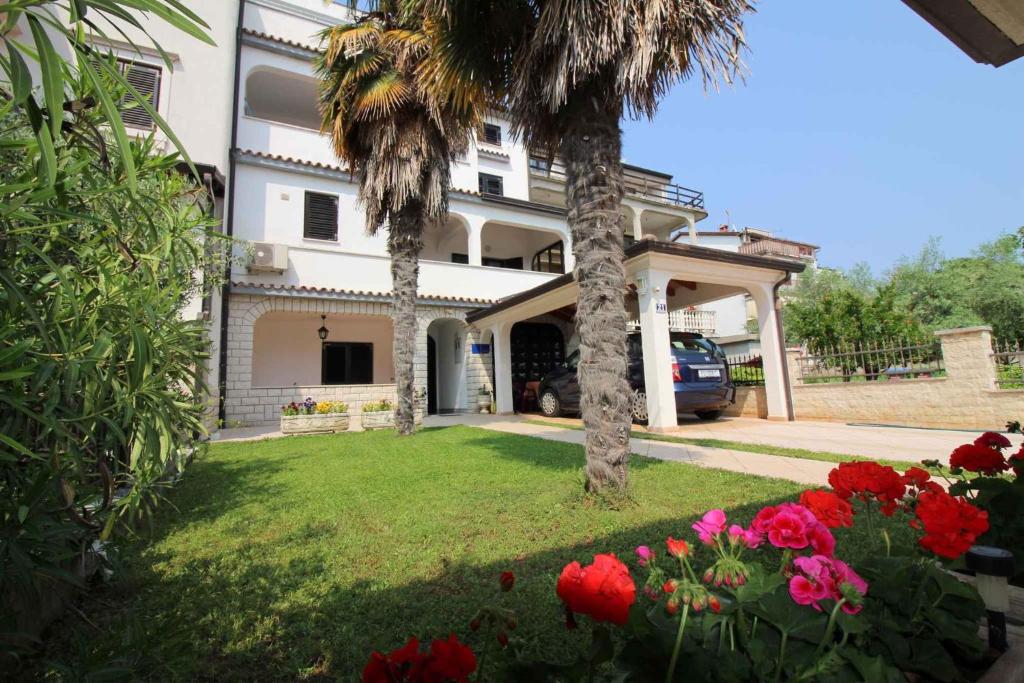 Vonkajšia záhrada v ubytovaní Apartment in Porec/Istrien 36860