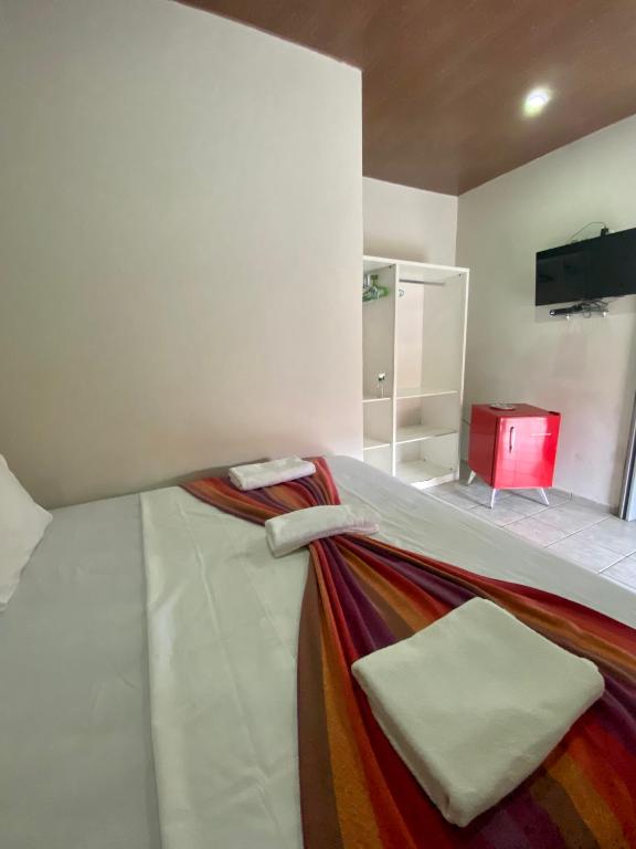 Postel nebo postele na pokoji v ubytování Noronha Good Vibes Hostel