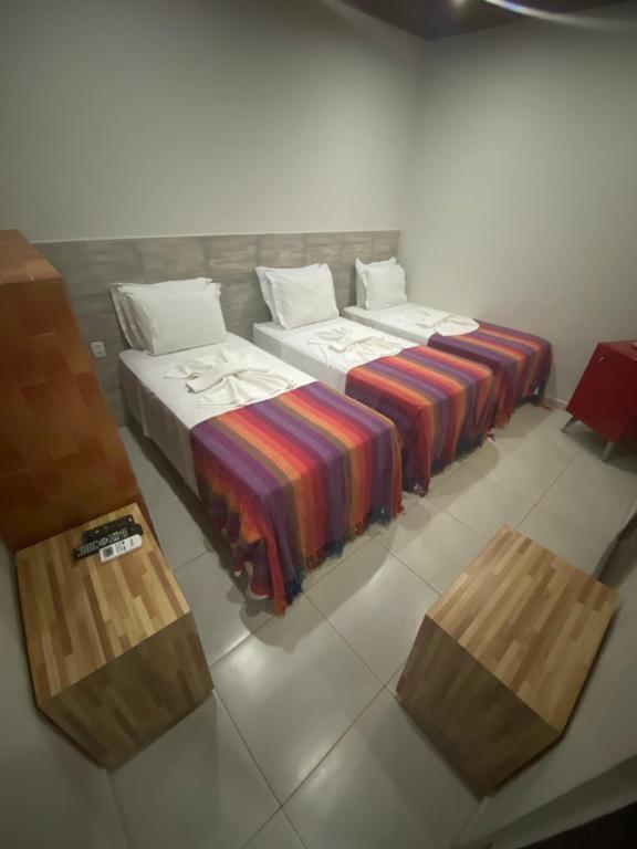 Postel nebo postele na pokoji v ubytování Noronha Good Vibes Hostel