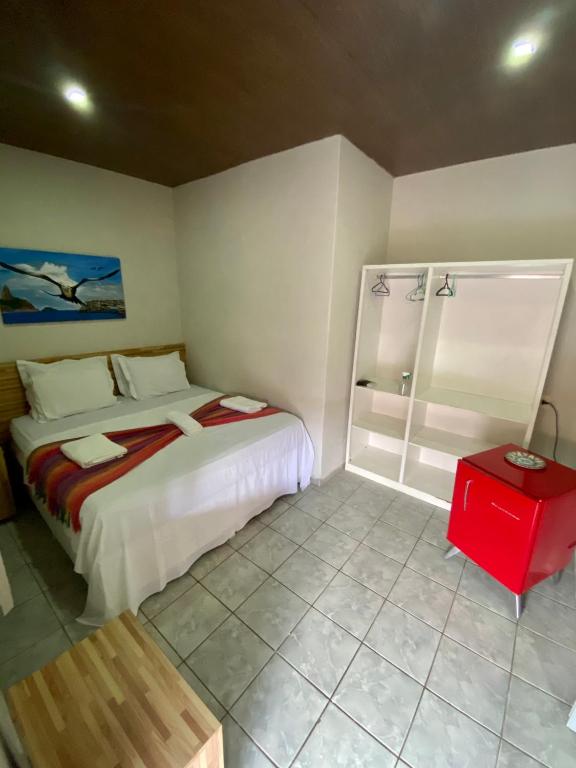 Postel nebo postele na pokoji v ubytování Noronha Good Vibes Hostel