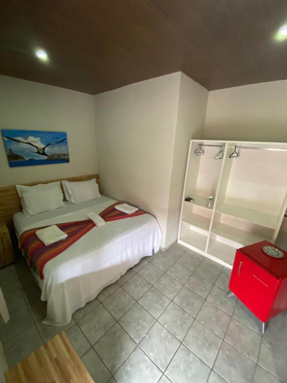Postel nebo postele na pokoji v ubytování Noronha Good Vibes Hostel