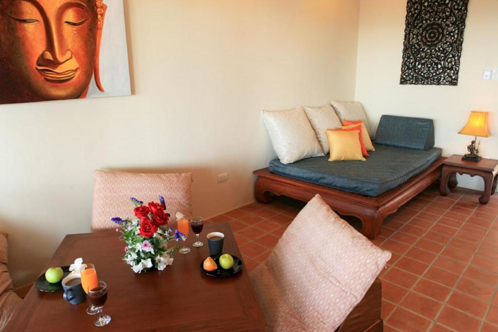 Posezení v ubytování Baan KanTiang See Villas - SHA Extra Plus