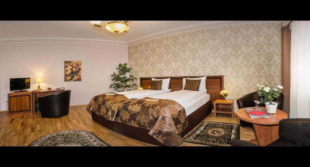 Postel nebo postele na pokoji v ubytování Hotel Boutique Bulevard