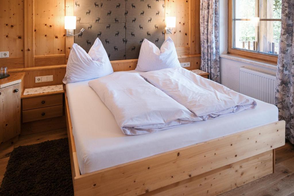 Postel nebo postele na pokoji v ubytování Landhaus Gemsenblick