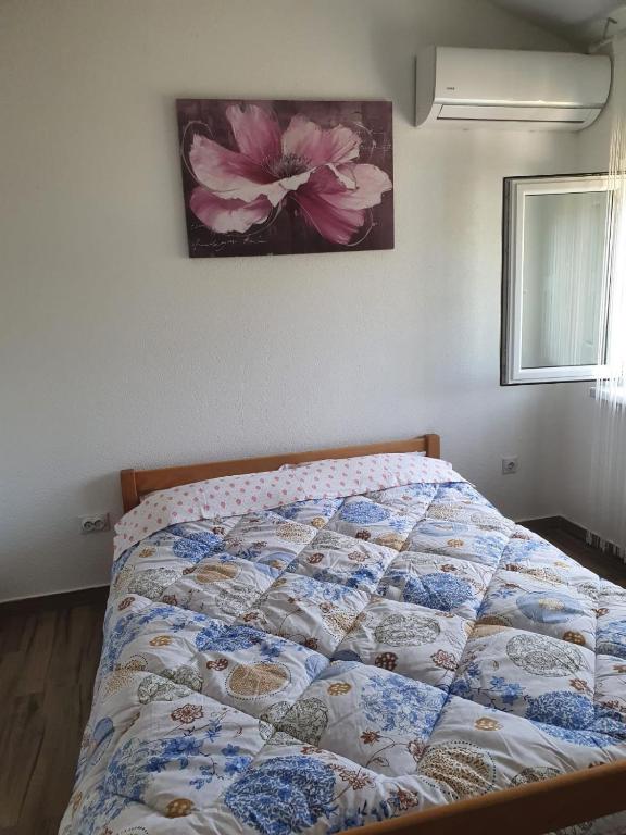 Postel nebo postele na pokoji v ubytování NEÐO Apartments Brda