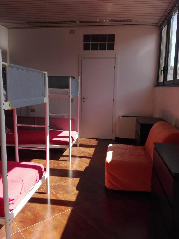 Posteľ alebo postele v izbe v ubytovaní Atmos Luxe Navigli