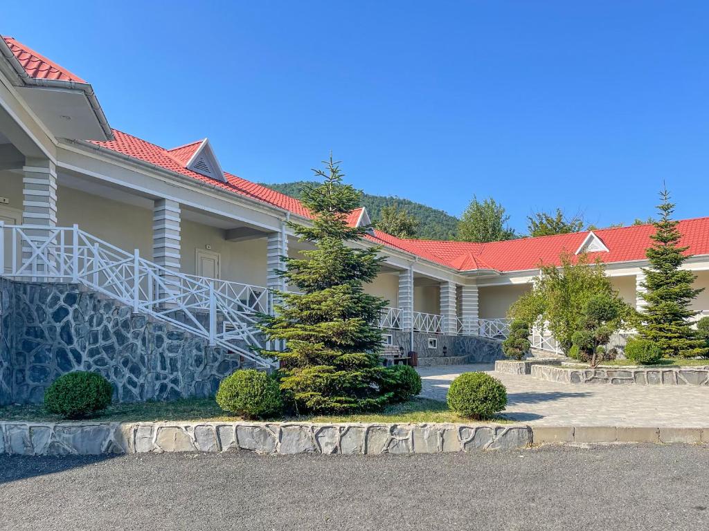 a row of houses with red roofs at Gabala Shooting Club in Gabala