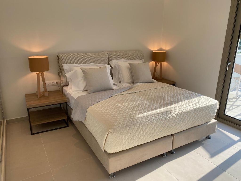 Postel nebo postele na pokoji v ubytování Luminous Luxury Apartments