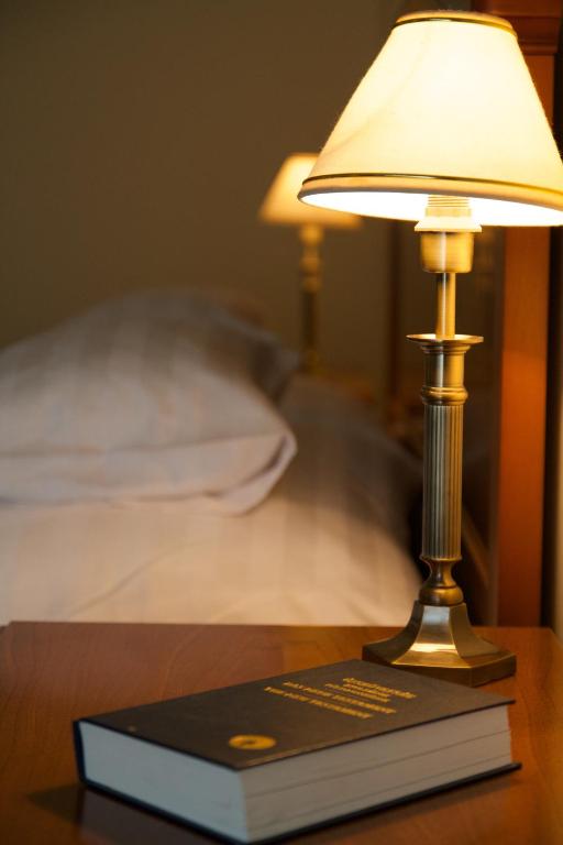Postel nebo postele na pokoji v ubytování Platán Hotel