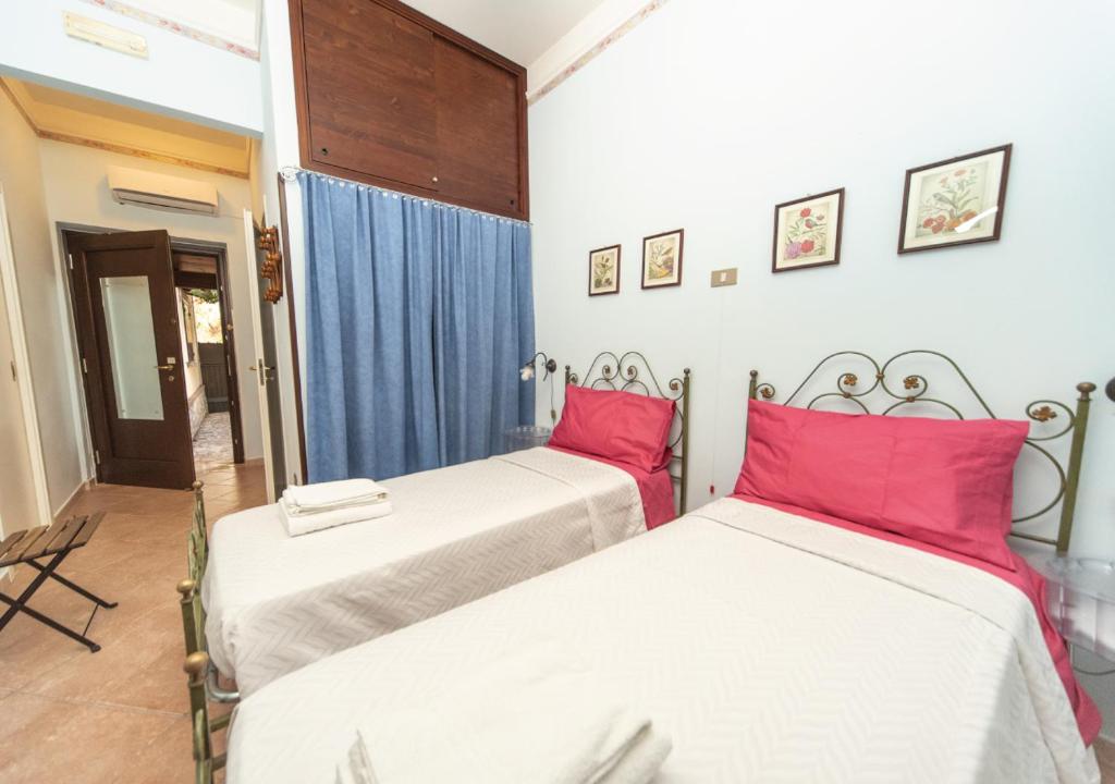 Łóżko lub łóżka w pokoju w obiekcie Il Sorgituro - Agriturismo