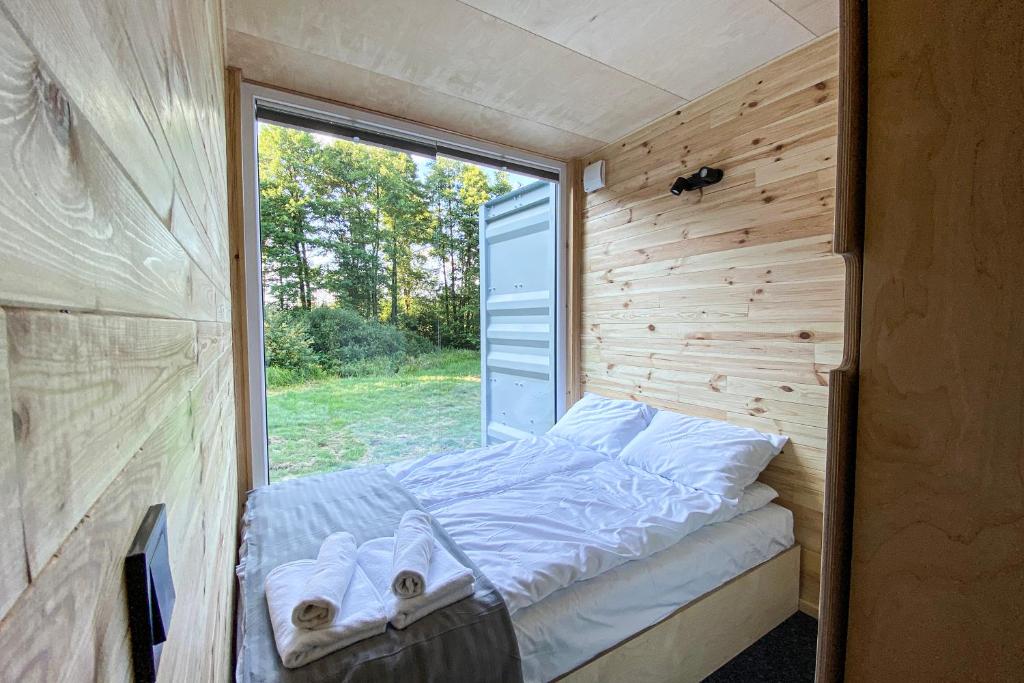 Postel nebo postele na pokoji v ubytování Arche Siedlisko Ujny