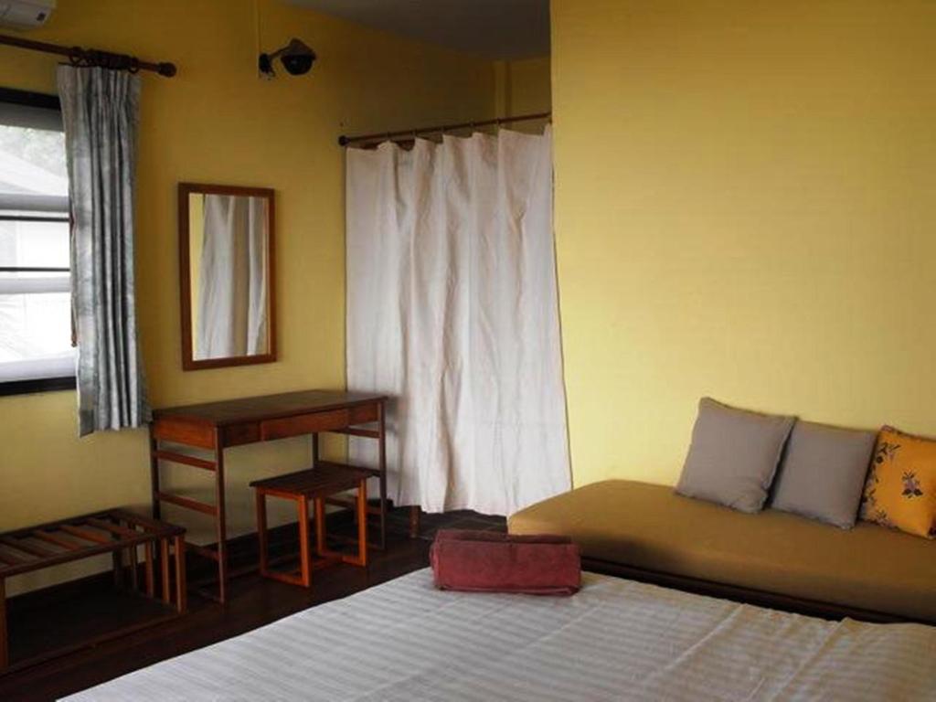 Postel nebo postele na pokoji v ubytování Sea Scene Resort