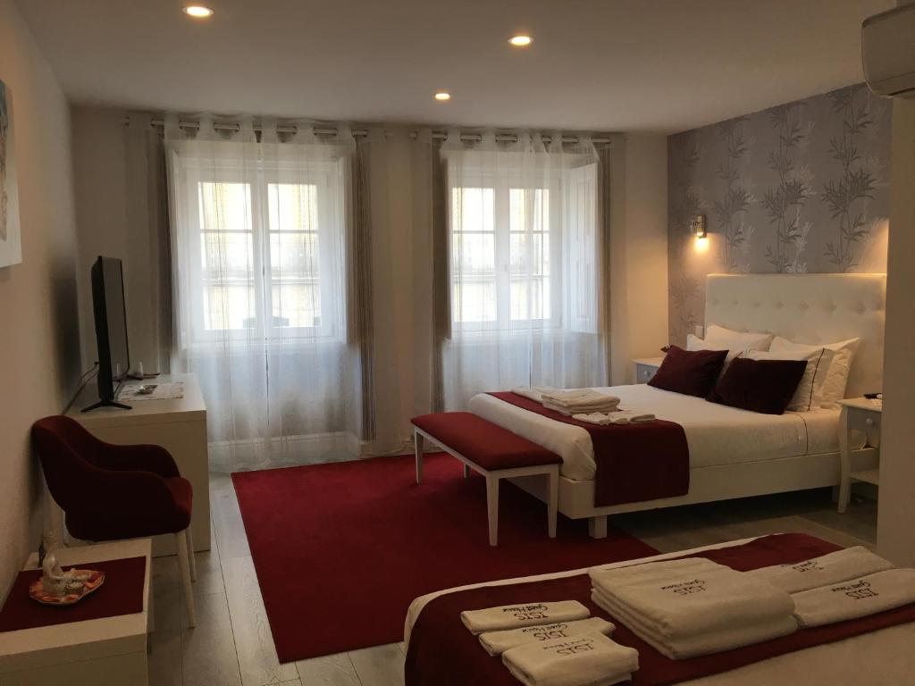 Postel nebo postele na pokoji v ubytování ÍSIS Guest House