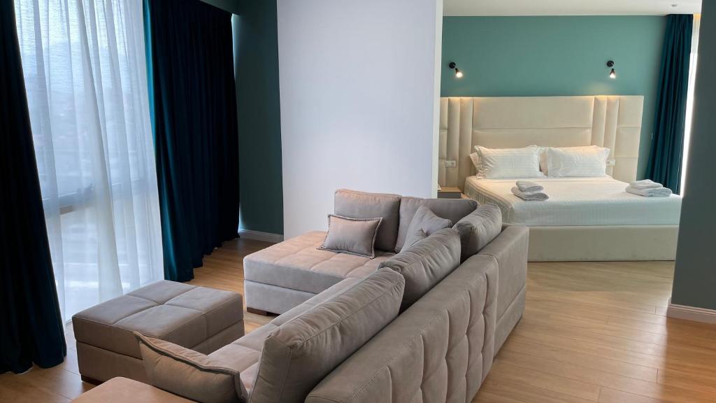 Llit o llits en una habitació de Granda Hotel