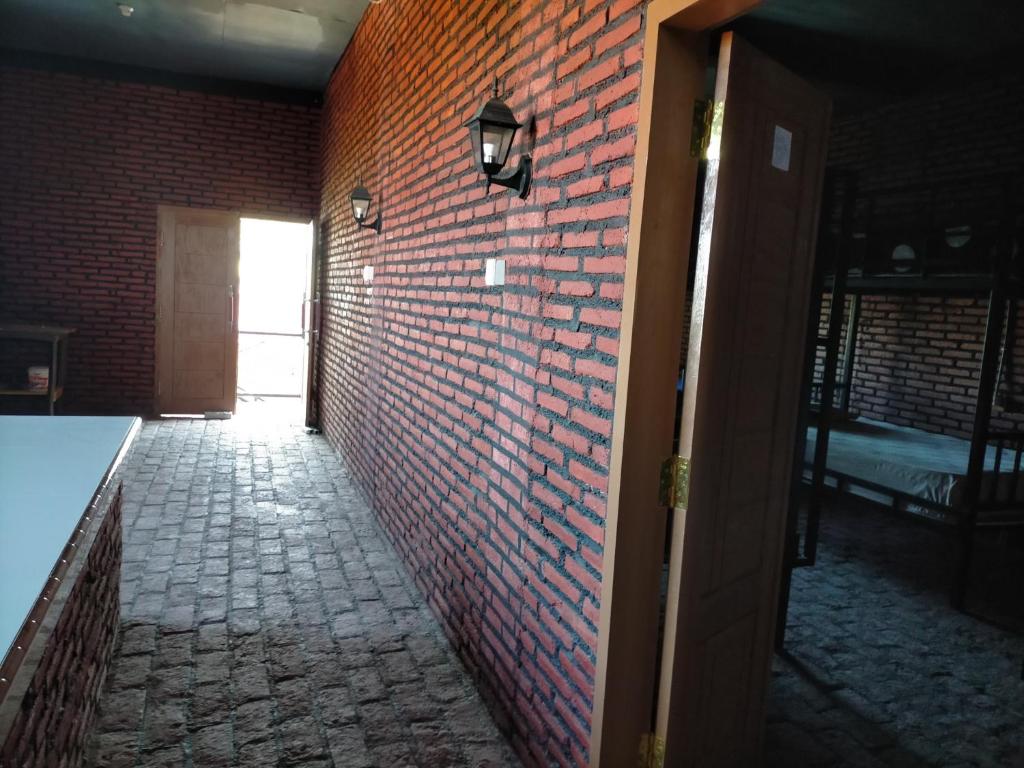 Letto o letti in una camera di Kendang Kempul Hostel